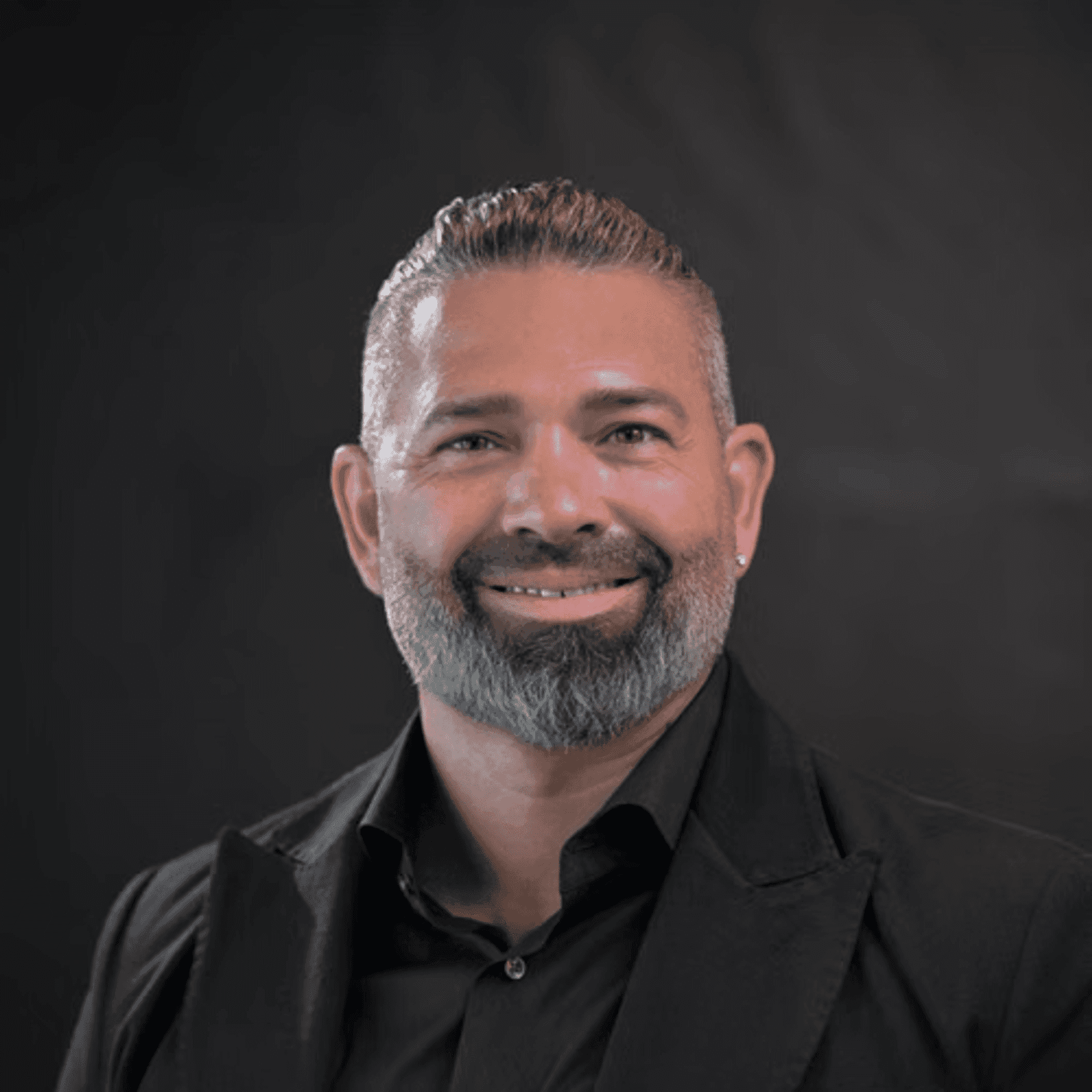 Portrait of Chad, a professional stylist at Chad + Co., showcasing their expertise and style.