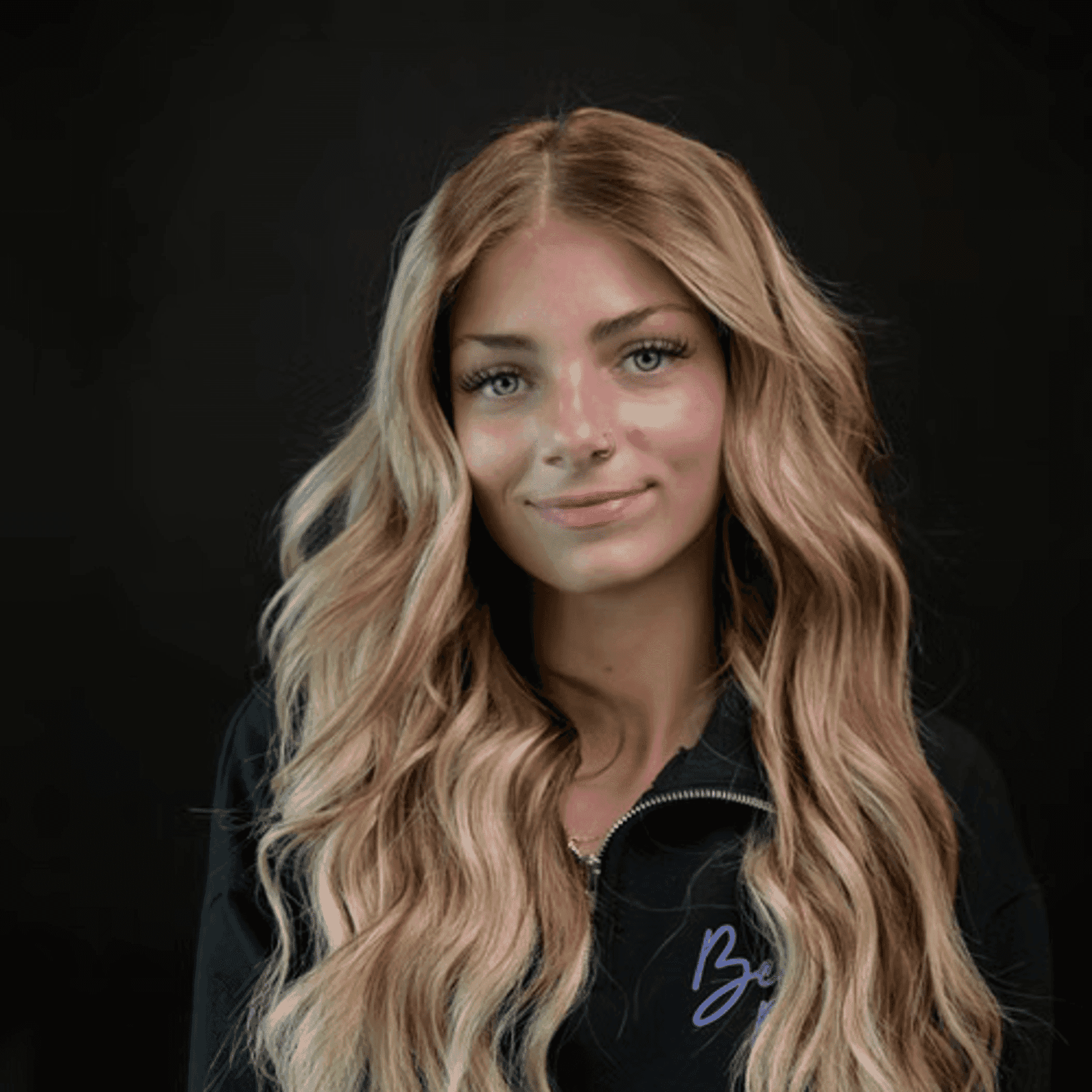 Portrait of Kaylee, a professional stylist at Chad + Co., showcasing their expertise and style.