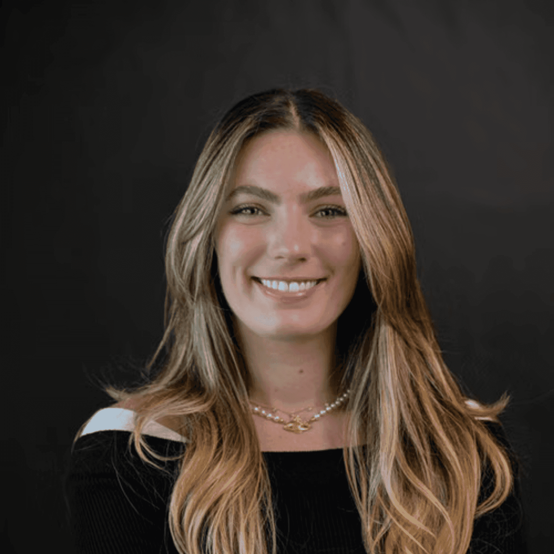 Portrait of Anabel, a professional stylist at Chad + Co., showcasing their expertise and style.